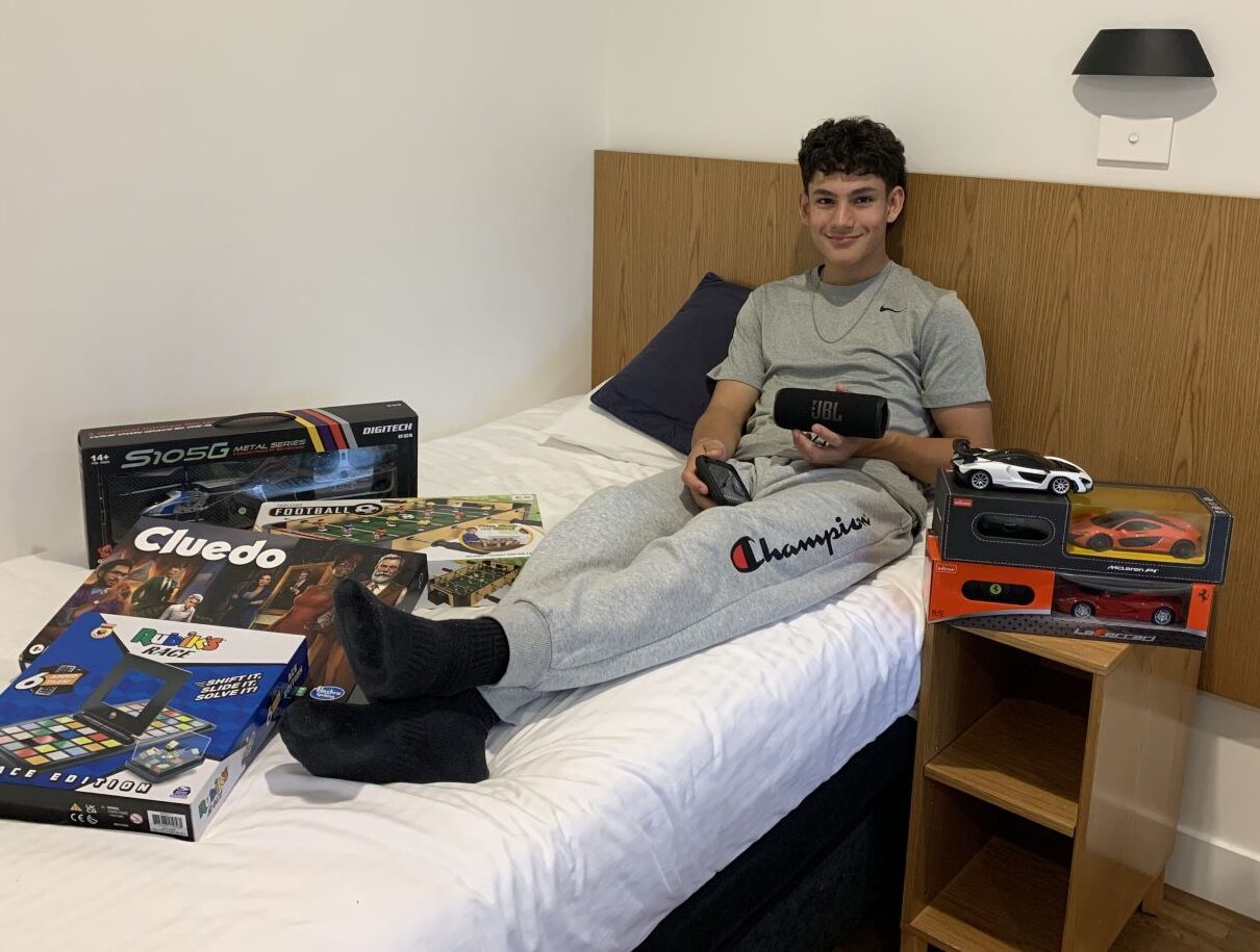 Elijah with items donated through the Ronald McDonald House Greater Western Sydney wishlist