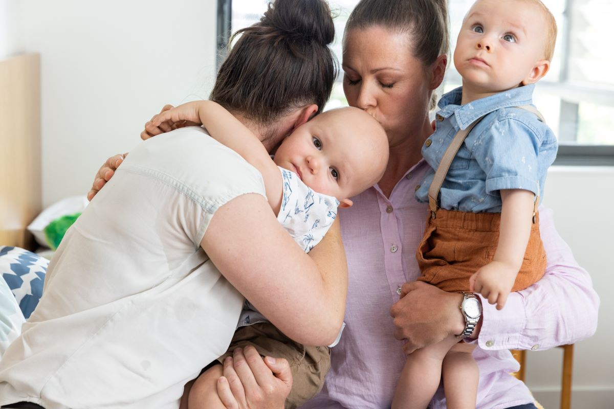 Poignant photo of two mums and their two young sons at Ronald McDonald House Greater Western Sydney Westmead