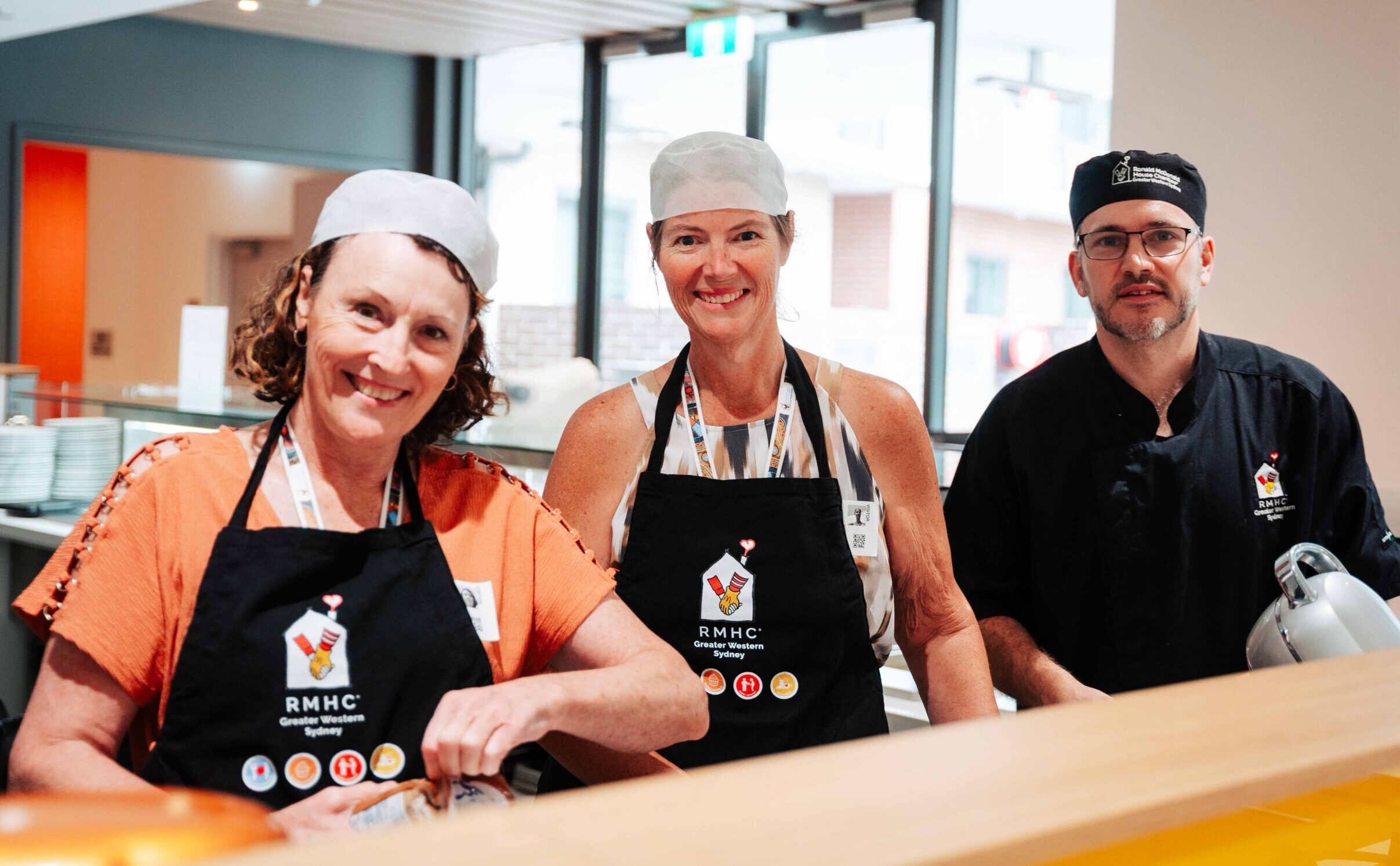 Two employees from ProYou Business Advisory preparing Meals from the Heart at Ronald McDonald House Greater Western Sydney Westmead
